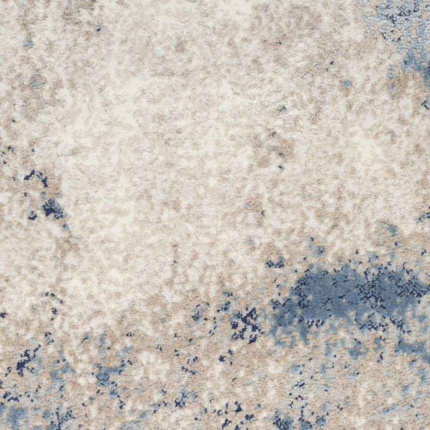 Close-up of Calvin Klein CK022 Infinity rug. Ivory, grey, and blue abstract pattern. Modern texture.