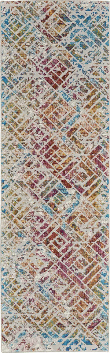 Close-up of Nourison Radiant Grey Multicolor rug. Colorful geometric pattern with blue, gold, and burgundy hues.