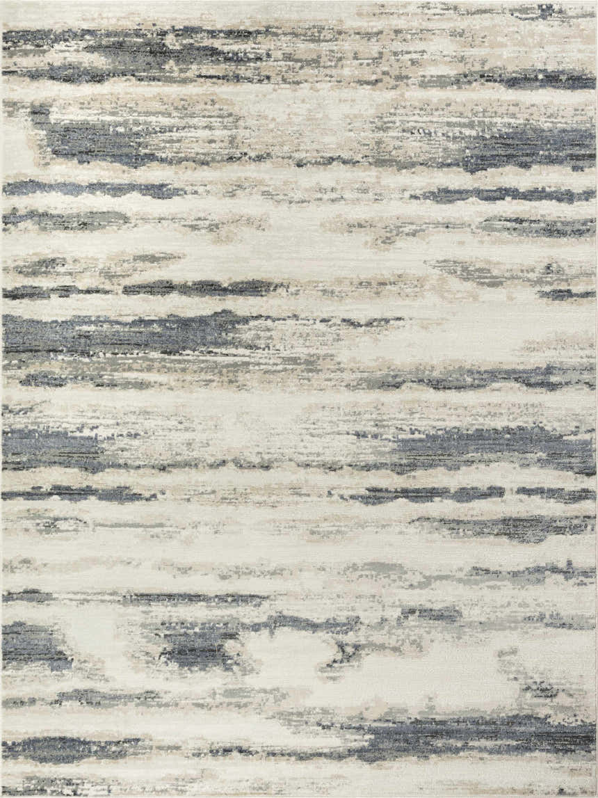 Close-up of the Nourison Serenity Home rug; blue, gray, and beige abstract stripes on a high pile.