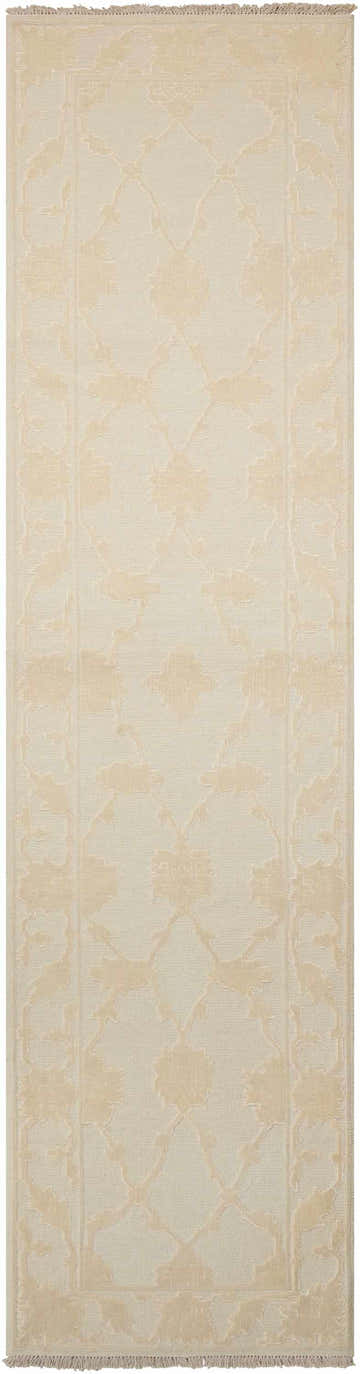 Close-up of Nourison Silk Pointe Ivory Vintage Runner Rug. Floral pattern in subtle chestnut tones. Handmade wool rug texture.