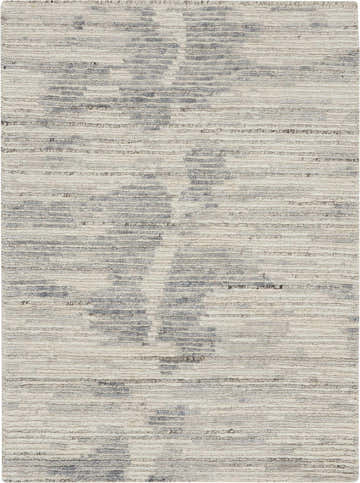 Close-up of the Nourison OCEAN Ivory Slate rug. Handmade, mid-century modern rug with chestnut accents.