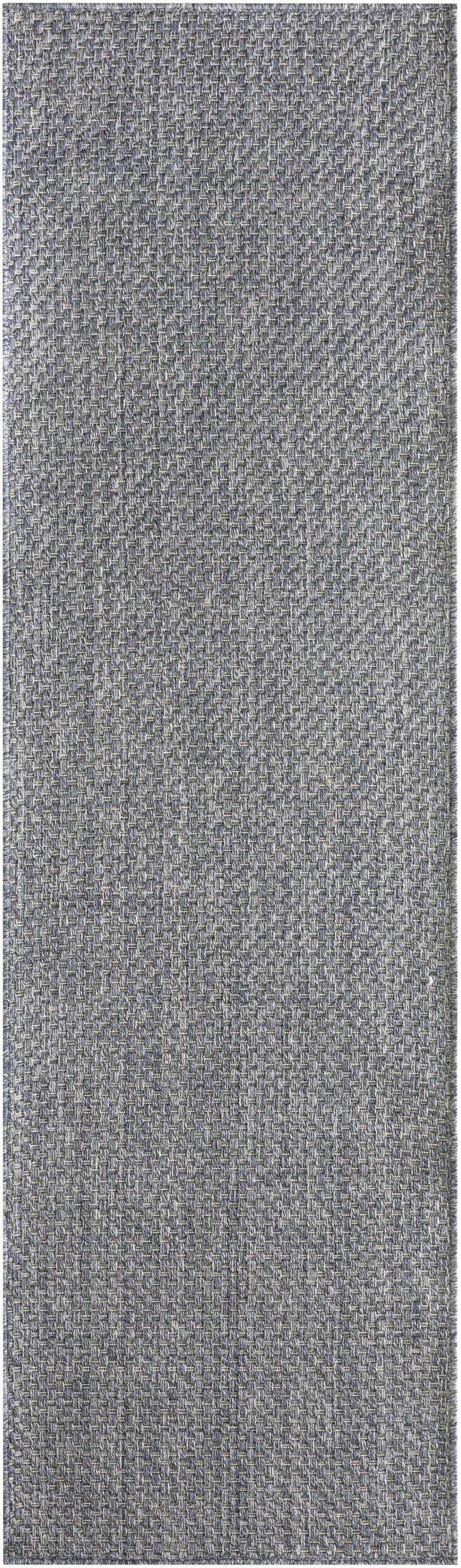 Close-up of the Nourison Tulum Denim Outdoor Area Rug showing its woven texture and subtle denim blue color.