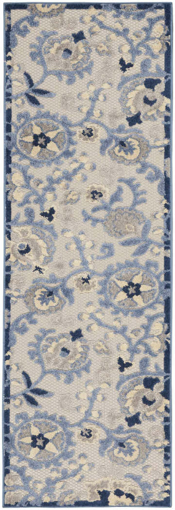 Close-up of Nourison Aloha Blue Grey Farmhouse Area Rug featuring a floral pattern in shades of blue, gray, and cream.