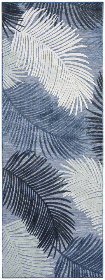 Close-up of Nourison Suncoast Denim Tropical Area Rug featuring a denim blue base and white and navy palm leaf pattern.