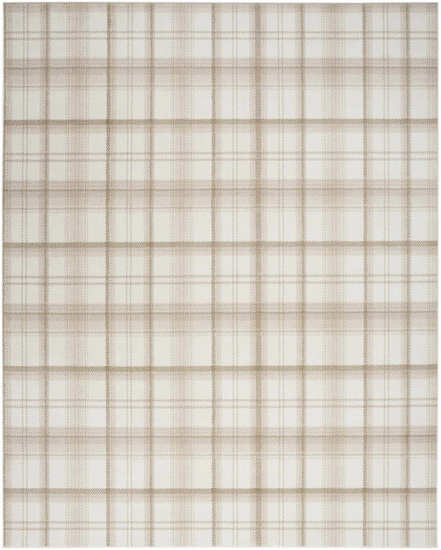 Close-up of Nourison Grafix Ivory Beige area rug featuring a subtle chestnut plaid pattern. Farmhouse style.