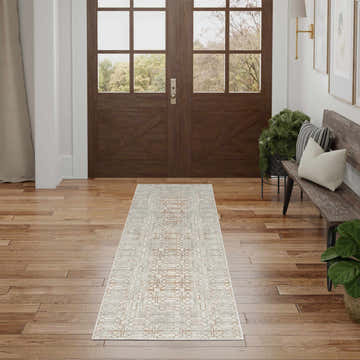 Entryway with wood floors, bench, and Nourison Desire Ivory Beige runner rug.