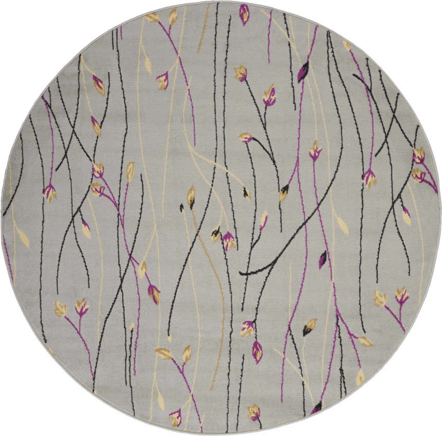 Round Nourison Grafix Grey rug with a contemporary floral design in black, gold, and purple on a gray polypropylene base.