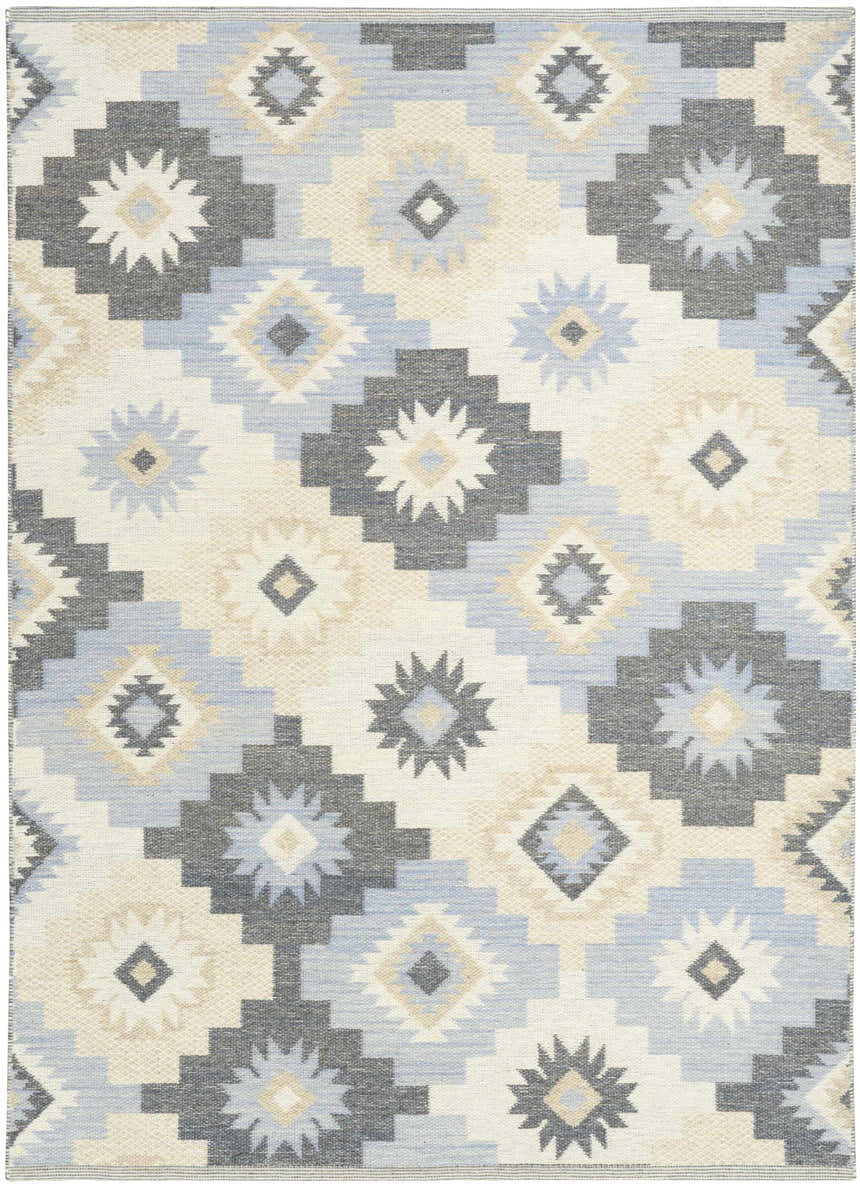 Close-up of Nourison Copenhagen Ivory Navy rug. Mid-century modern design with geometric shapes in ivory, navy, beige and gray.