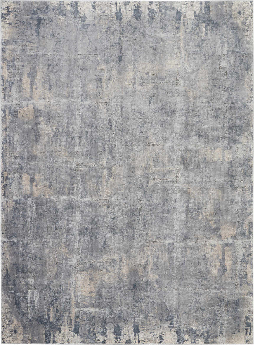 Close-up of the Nourison Rustic Textures Grey Beige Area Rug, featuring a distressed, modern design and subtle texture.