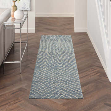 Hallway with Nourison Colorado Indigo Ivory rug runner, chevron pattern, wood floors, and console table.