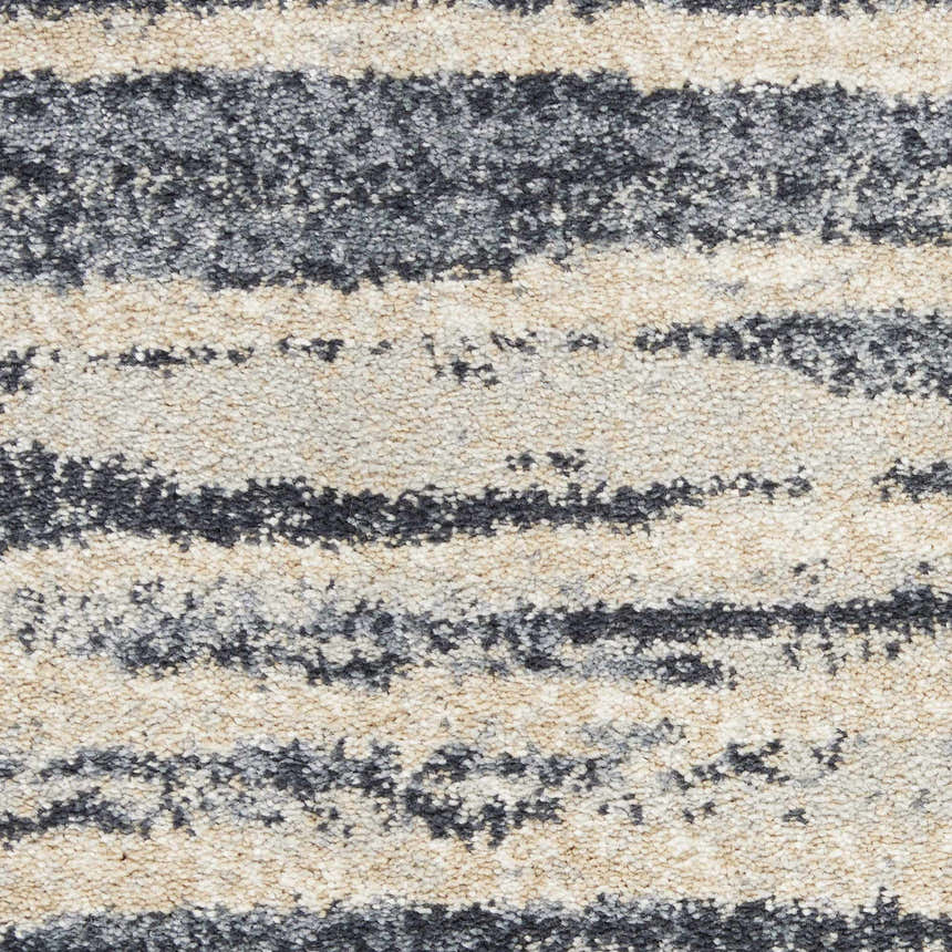 Close-up of Nourison Moroccan Celebration rug. Blue and beige abstract stripe pattern, soft texture.