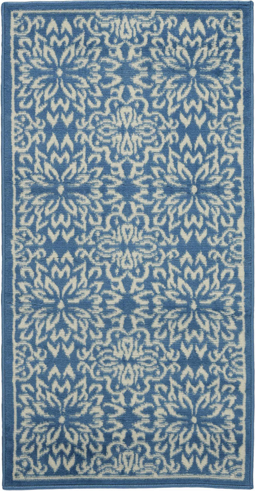 Close-up of Nourison Jubilant Ivory Blue Farmhouse Area Rug. Features a floral pattern in ivory on a blue background.