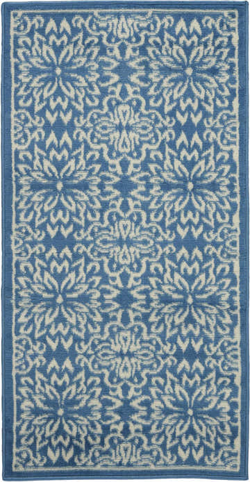 Close-up of Nourison Jubilant Ivory Blue Farmhouse Area Rug. Features a floral pattern in ivory on a blue background.