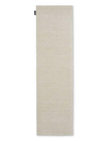 Close-up of the Calvin Klein Jackson rug in ivory and grey. Modern, machine-made runner with subtle horizontal texture.