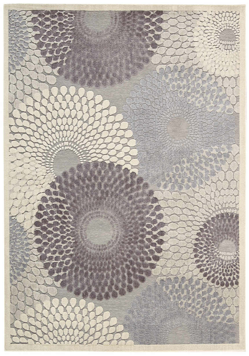 Close-up of Nourison Graphic Illusions Grey Mid-Century Modern rug with floral medallion pattern in gray, white, and taupe.