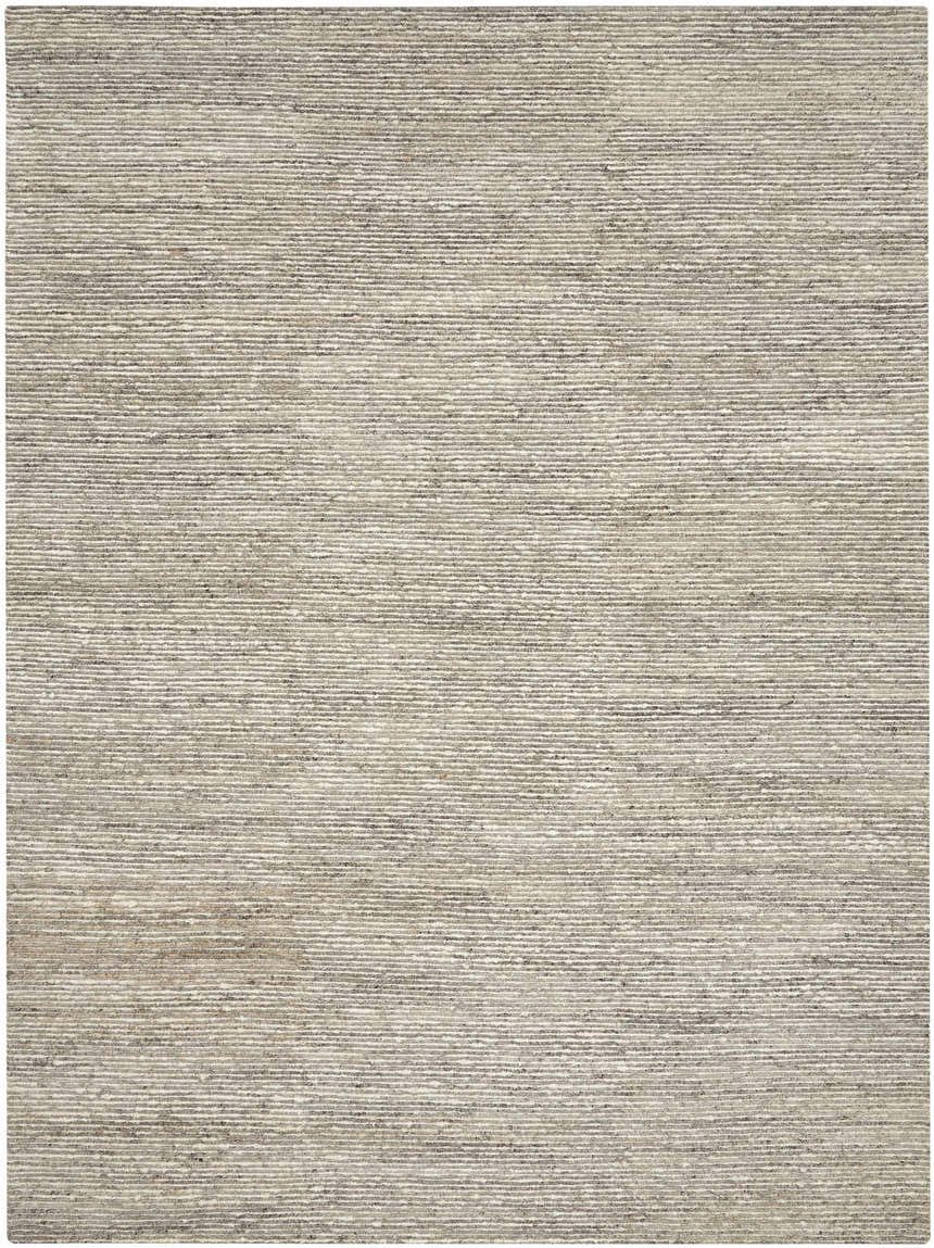 Close-up of the Calvin Klein Kathmandu Grey rug. Handmade wool and jute rug with a subtle horizontal stripe pattern.