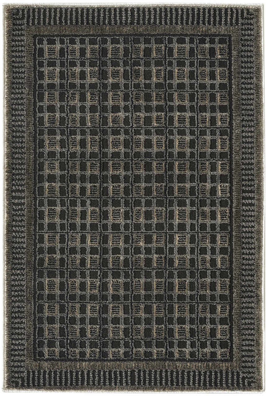 Close-up of the Nourison Nordic Black Taupe Art Deco Indoor Area Rug, featuring a grid pattern and textured border.