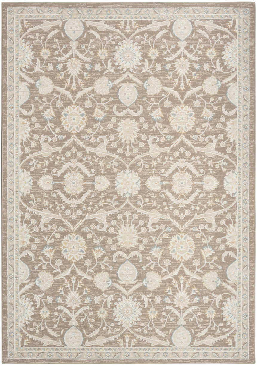 Close-up of the Nourison Isla Mocha Vintage Indoor Area Rug, featuring a light brown floral pattern and vintage style.