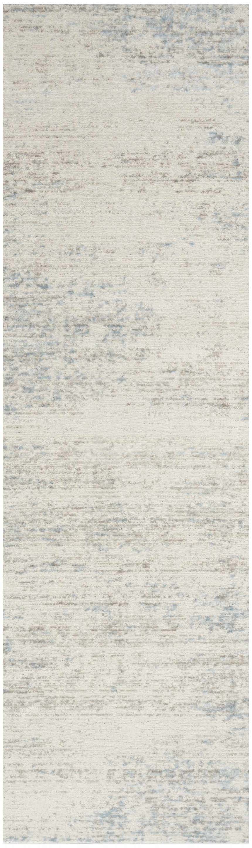Close-up of the Calvin Klein CK029 Captivating Cream Blue rug. Modern design with subtle blue and cream hues.