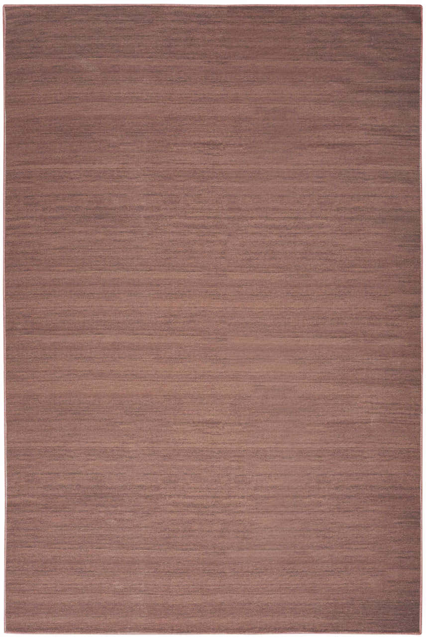 Close-up of the Nourison Essentials Mocha rug, showcasing its light brown color and subtle, horizontal texture.