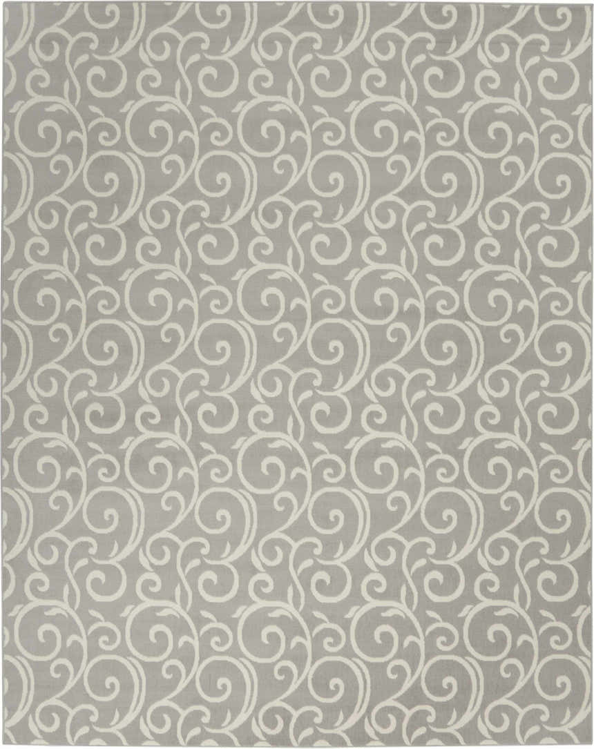 Close-up of the Nourison Grafix Grey Contemporary Indoor Area Rug, featuring a swirling, leafy off-white pattern on a gray background.