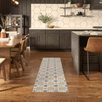 Modern kitchen with a Nourison Nordic Rust Multicolor runner rug on hardwood floors.