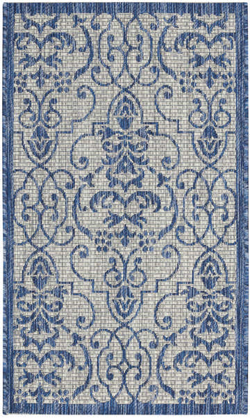 Close-up of Nourison Country Side Ivory Blue Farmhouse Area Rug, featuring a detailed floral and scroll pattern.