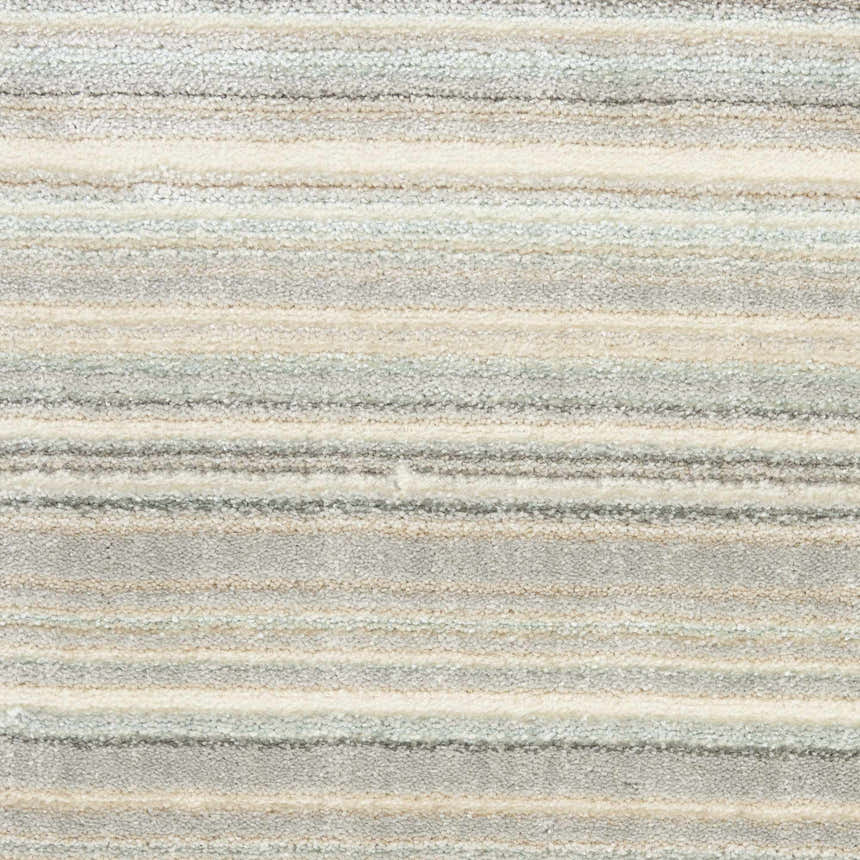 Close-up of Nourison Marmara rug featuring a striped pattern in grey, ivory, teal, and chestnut hues.