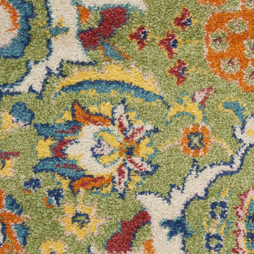 Close up of the Nourison Allur Sage Ivory rug showing its floral bohemian pattern and soft, textured pile.