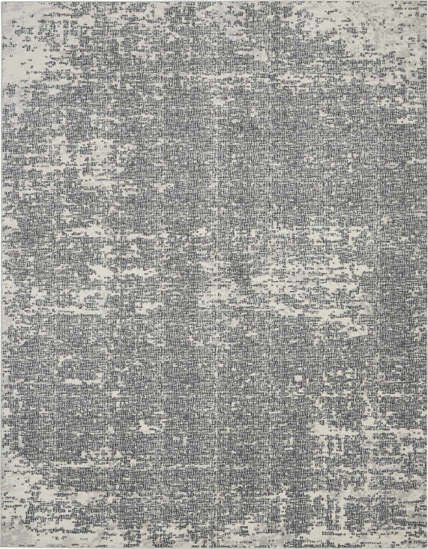 Close-up of Calvin Klein CK970 Vapor Ivory Black rug. Modern design with abstract, textured black lines on an ivory background.