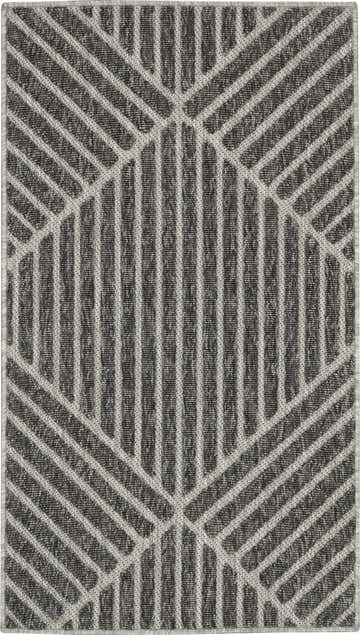 Close-up of the Nourison Cozumel Dark Grey rug. Modern design with geometric lines and medium gray tones.