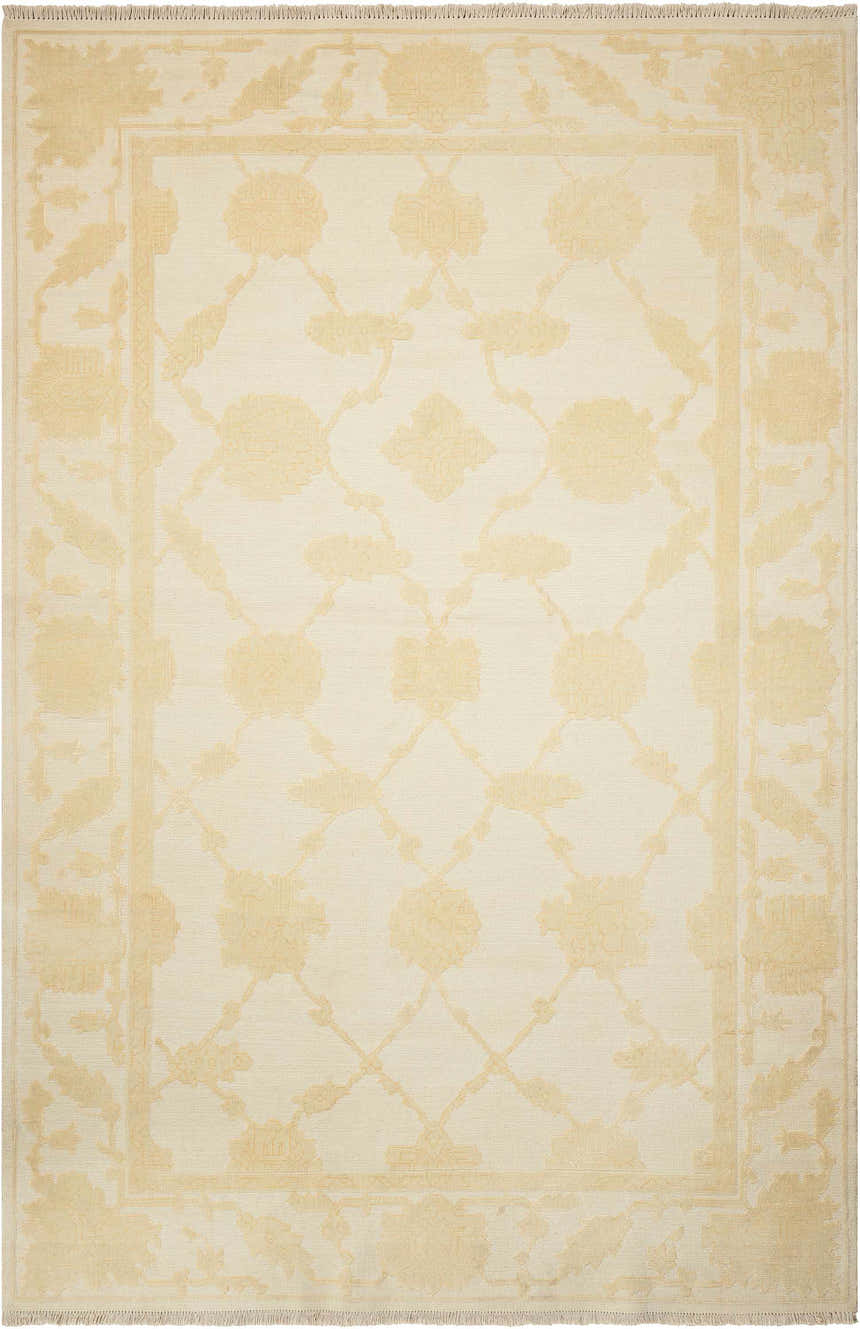Close-up of the Nourison Silk Pointe Ivory Vintage Area Rug with a floral pattern and chestnut accents.