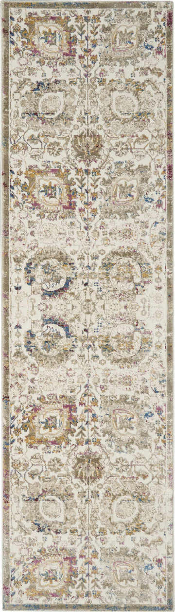 Close-up of Nourison Melody Ivory Multicolor Bohemian runner rug. Distressed floral pattern in chestnut, gold, blue, and mauve.