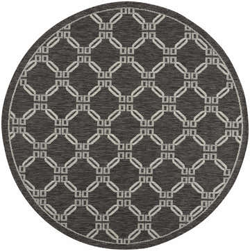 Close-up of the round Nourison Country Side Charcoal rug featuring a geometric taupe pattern.