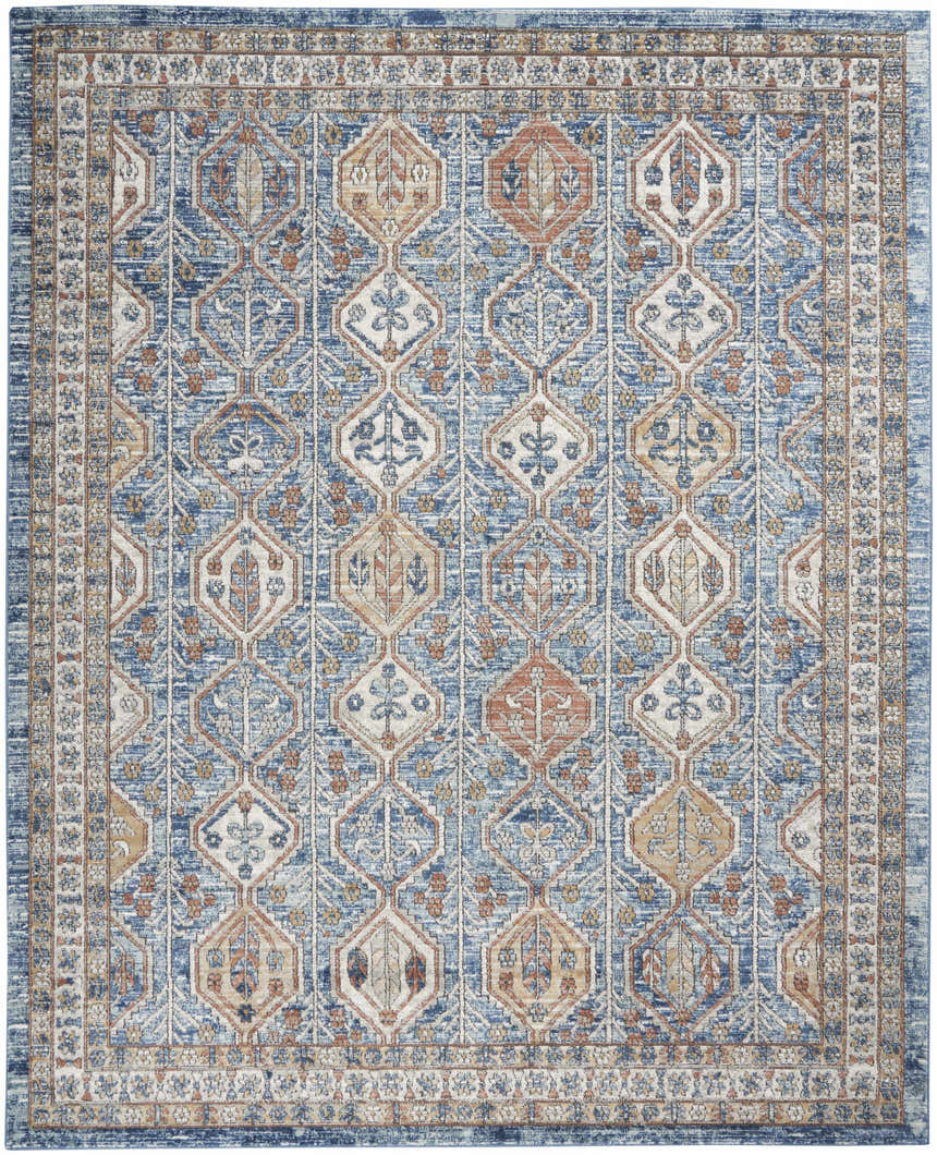 Close-up of Nourison Quarry Blue Multicolor rug. Contemporary style with blue, tan, and rust geometric pattern.