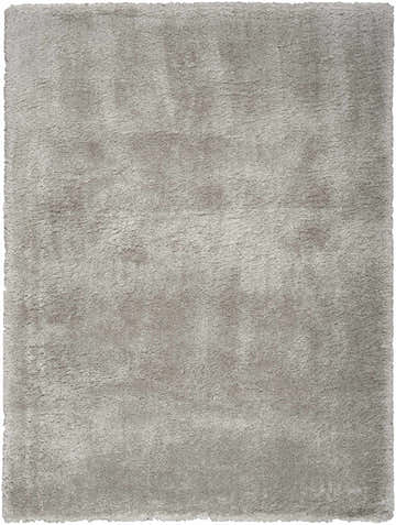 Close-up of a soft, silver gray Nourison Dreamy Shag rug. The rectangular rug has a plush, textured shag pile.