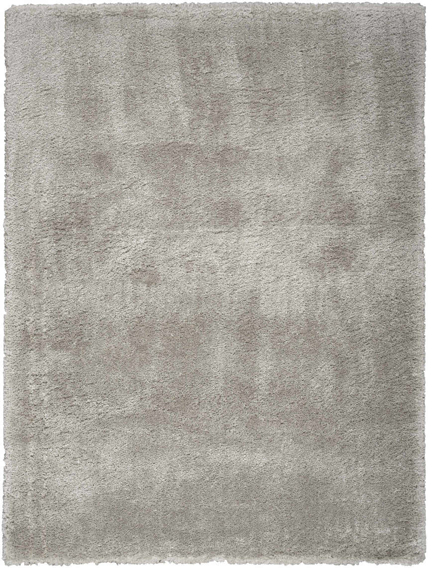 Close-up of a soft, silver gray Nourison Dreamy Shag rug. The rectangular rug has a plush, textured shag pile.