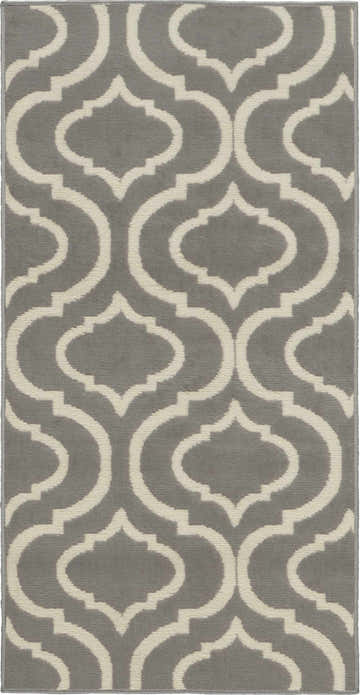 Close up of Nourison Jubilant Grey rug with an ivory quatrefoil pattern on a soft gray background. Contemporary style.