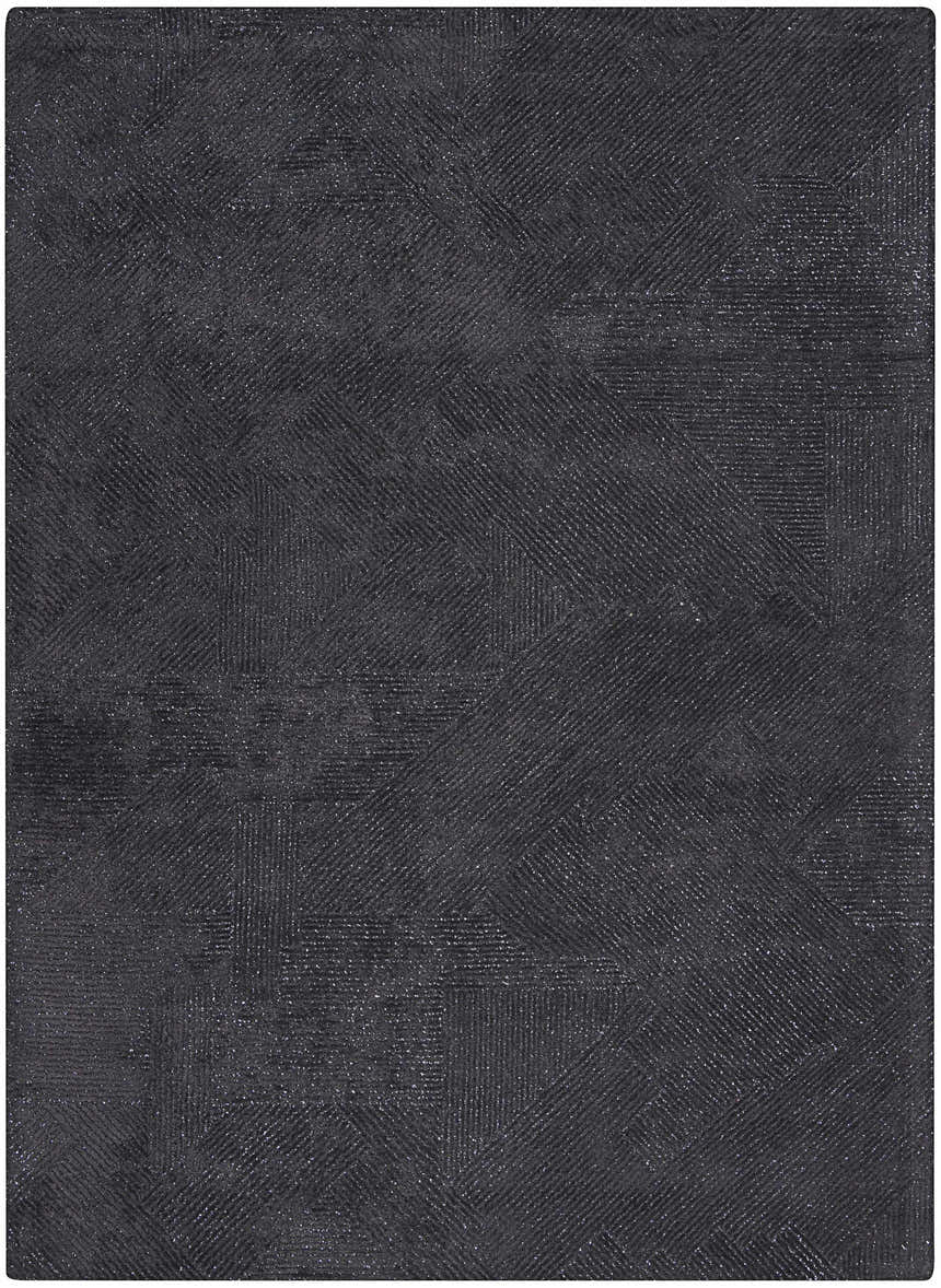 Close-up of the black Michael Amini MA30 Star rug, showing a geometric pattern and subtle texture.