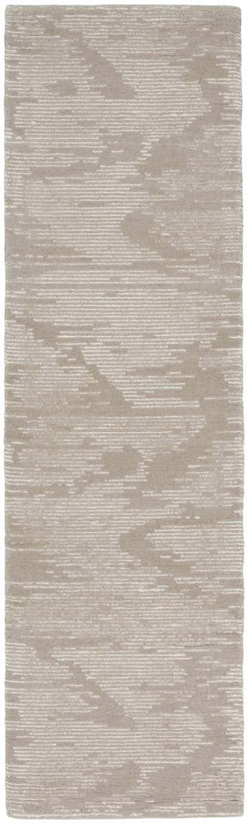 Close-up of the Michael Amini MA30 Star Taupe/Ivory rug. Wool rug with a modern, abstract pattern in neutral taupe and ivory.