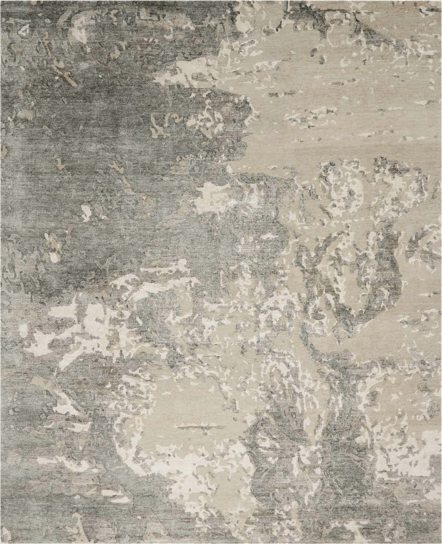 Close-up of the Nourison Silk Shadows Sand area rug. Features a modern, abstract design in sandstone, gray, and ivory hues.