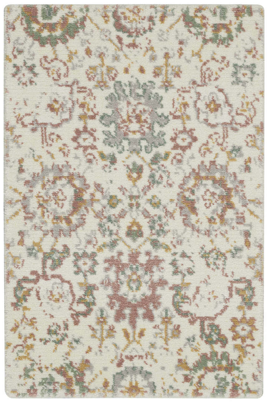Close-up of the Nourison Twilight Ivory Multicolor rug, featuring a transitional floral pattern in chestnut, gold, and green.