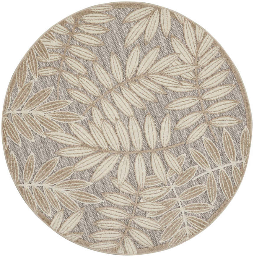 Close-up of round Nourison Aloha Natural Tropical Area Rug. Beige leaves pattern on a textured gray background.