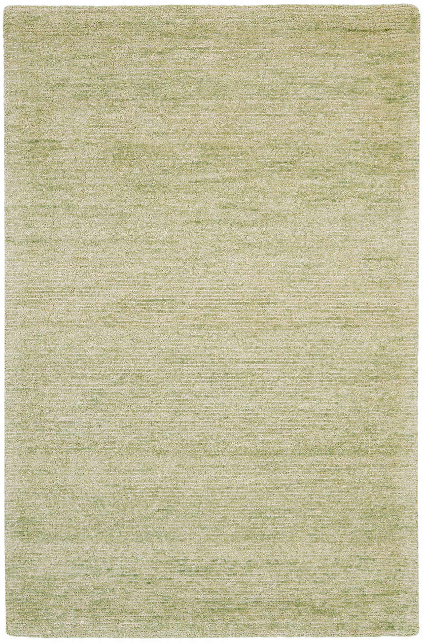 Close-up of the Nourison Weston Citron Rug. The bamboo silk rug has a subtle horizontal texture and soft green color.