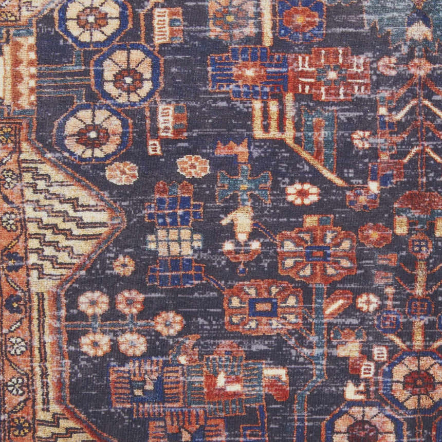 Close-up of the Nourison Fulton Red Vintage Indoor Area Rug, showcasing its intricate floral and geometric patterns.