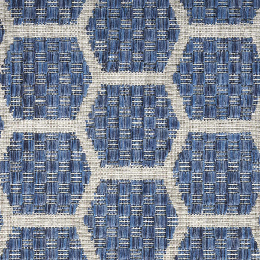 Close-up of the Nourison Twist Reversible Blue Modern Area Rug, featuring a geometric pattern and woven texture.