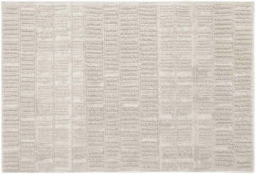 Close-up of the Nourison Nordic Ivory area rug with a subtle, textured geometric pattern.