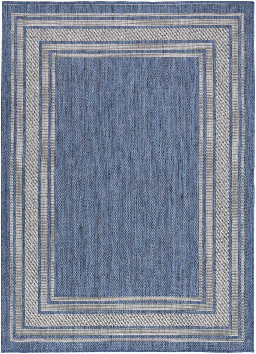 Close-up of the Nourison Horizon Indoor/Outdoor Denim Modern Area Rug, featuring a border pattern and blue color.