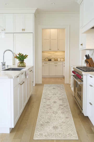 Bright kitchen with Nourison Shadows Ivory Vintage rug runner.