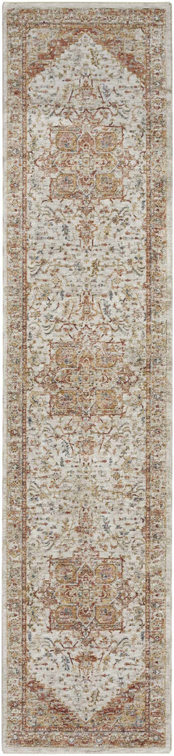 Close-up of Nourison Sahar Ivory Rust rug. Vintage style rug with chestnut, ivory, rust, and blue floral pattern.